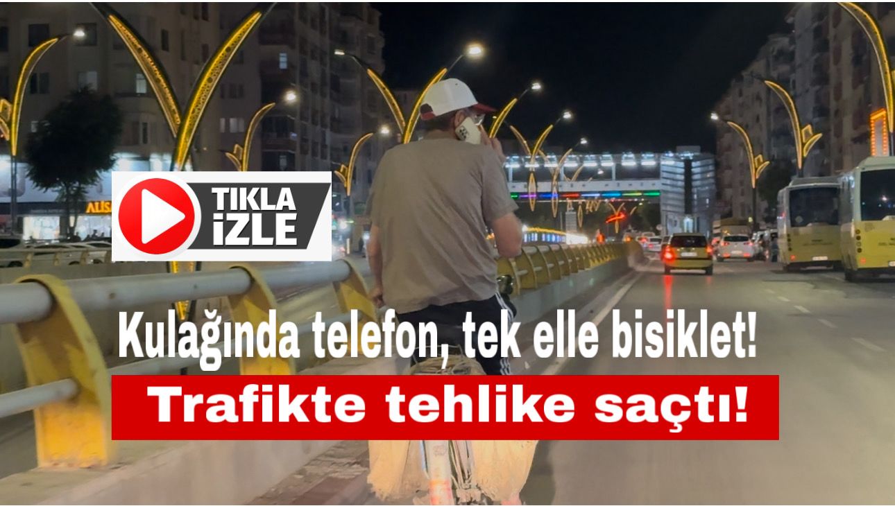 Aksaray’da anayolda telefonla konuşarak bisiklet süren bir kişi, hem kendi