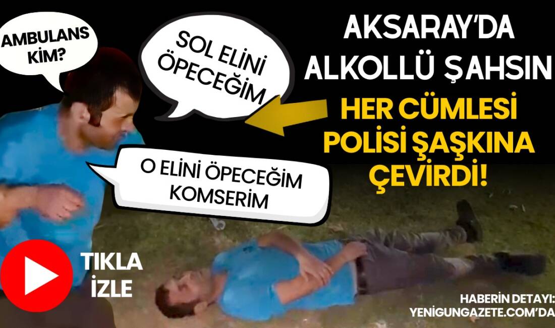 Aksarayda parkta yerde yatan alkollü şahsın polise el öpme ısrarı,