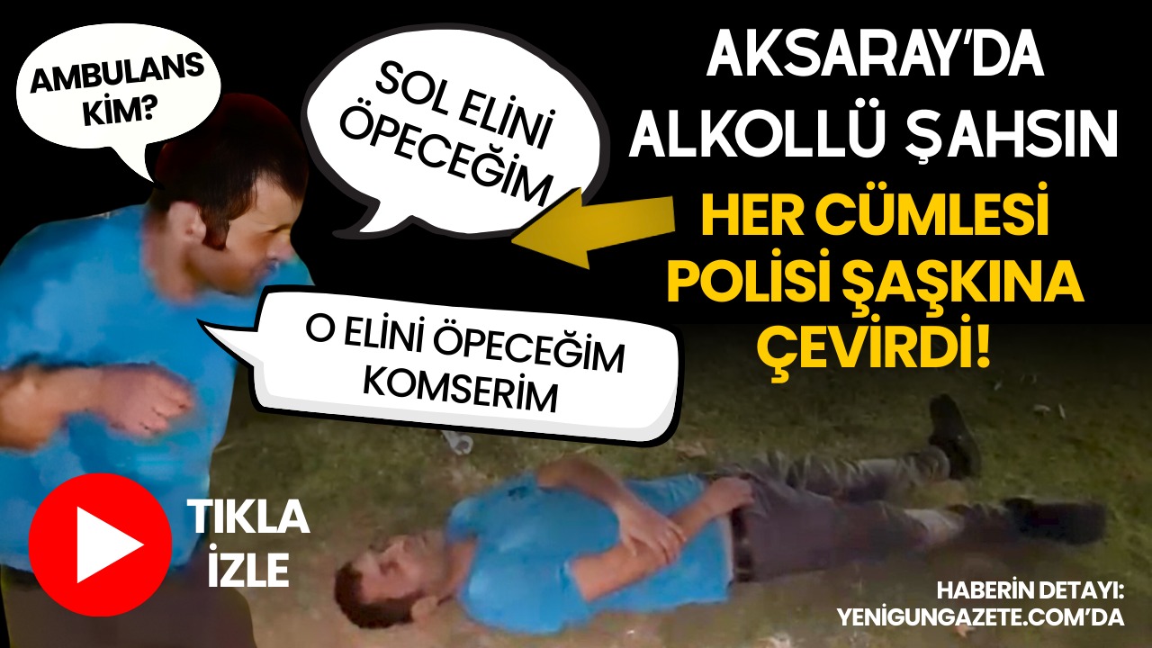 Aksarayda parkta yerde yatan alkollü şahsın polise el öpme ısrarı,