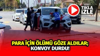 Aksaray caddelerinde düğün konvoyunun önünü kesen çocuklar, para almak için