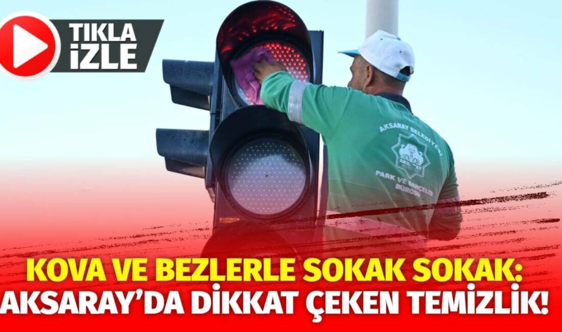 Aksaray’da belediye işçileri kova ve bezlerle sokak lambalarını tek tek