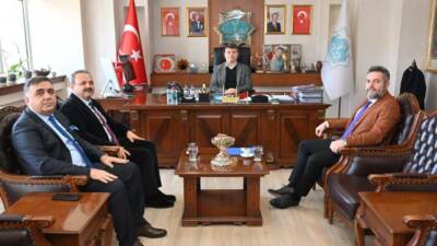 Aksaray Belediye Başkanı Dr. Evren Dinçer, Aksaray Üniversitesi Rektörü Prof.