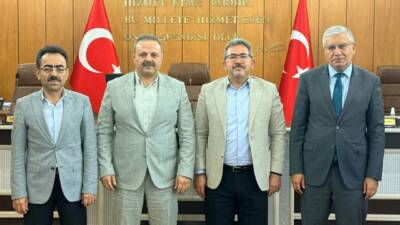 Aksaray Üniversitesi Rektörü Prof. Dr. Alpay Arıbaş ve üniversite yönetimi,